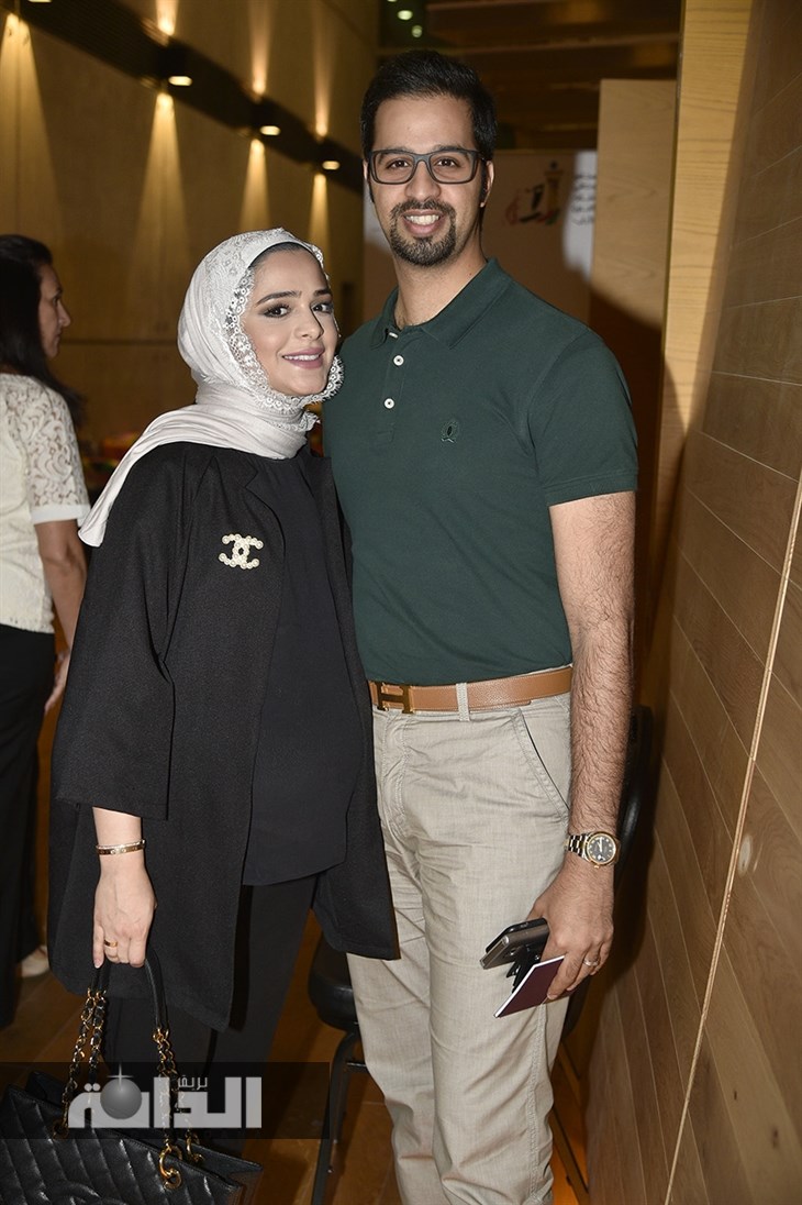 م حسين العرادي وزوجته